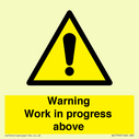 gender-neutral-construction-warning-sign-warning-work-in-progress-above-with-exc~
